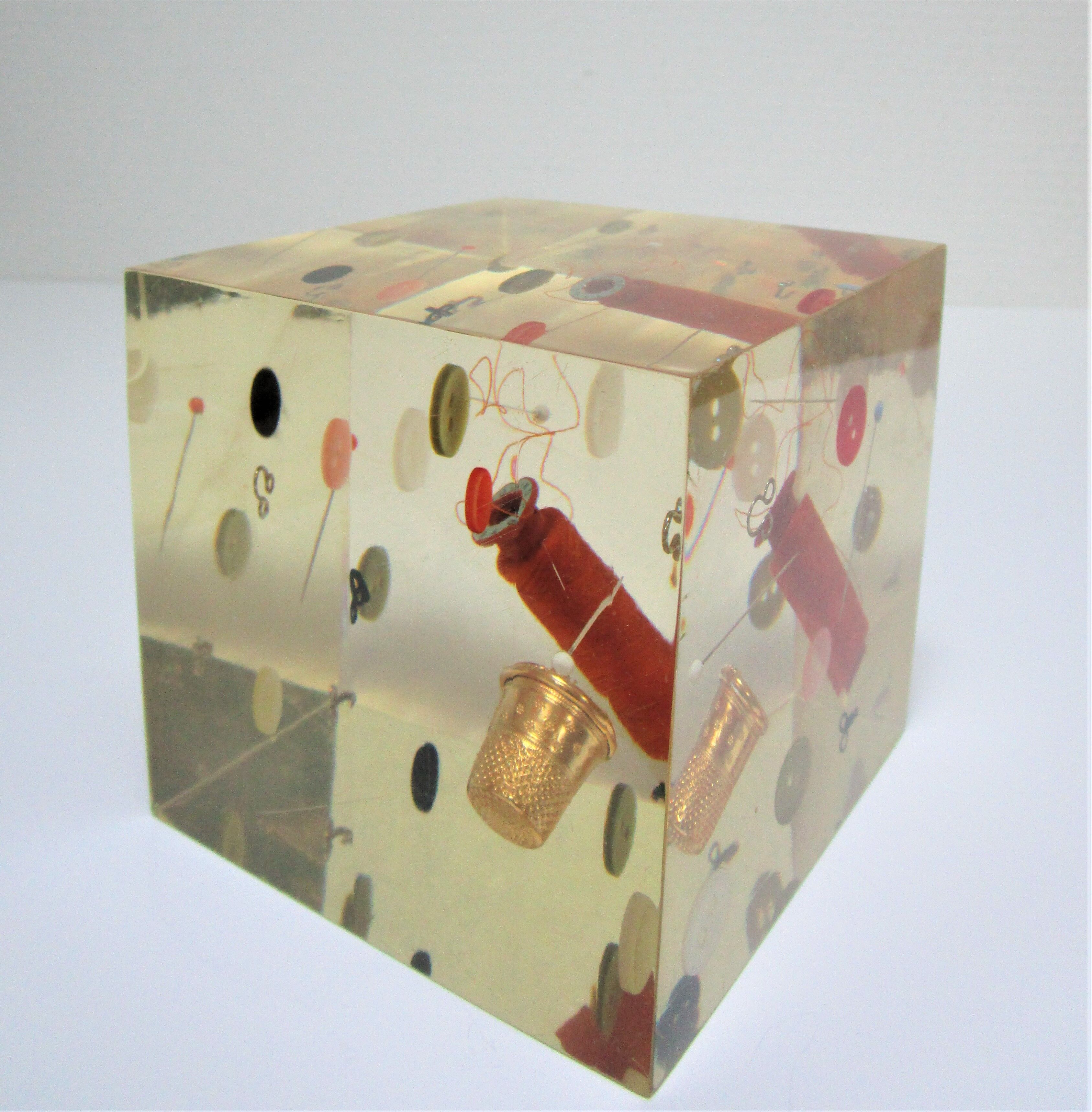 Paperweight sculpture block resin inclusions sewing design 70s
