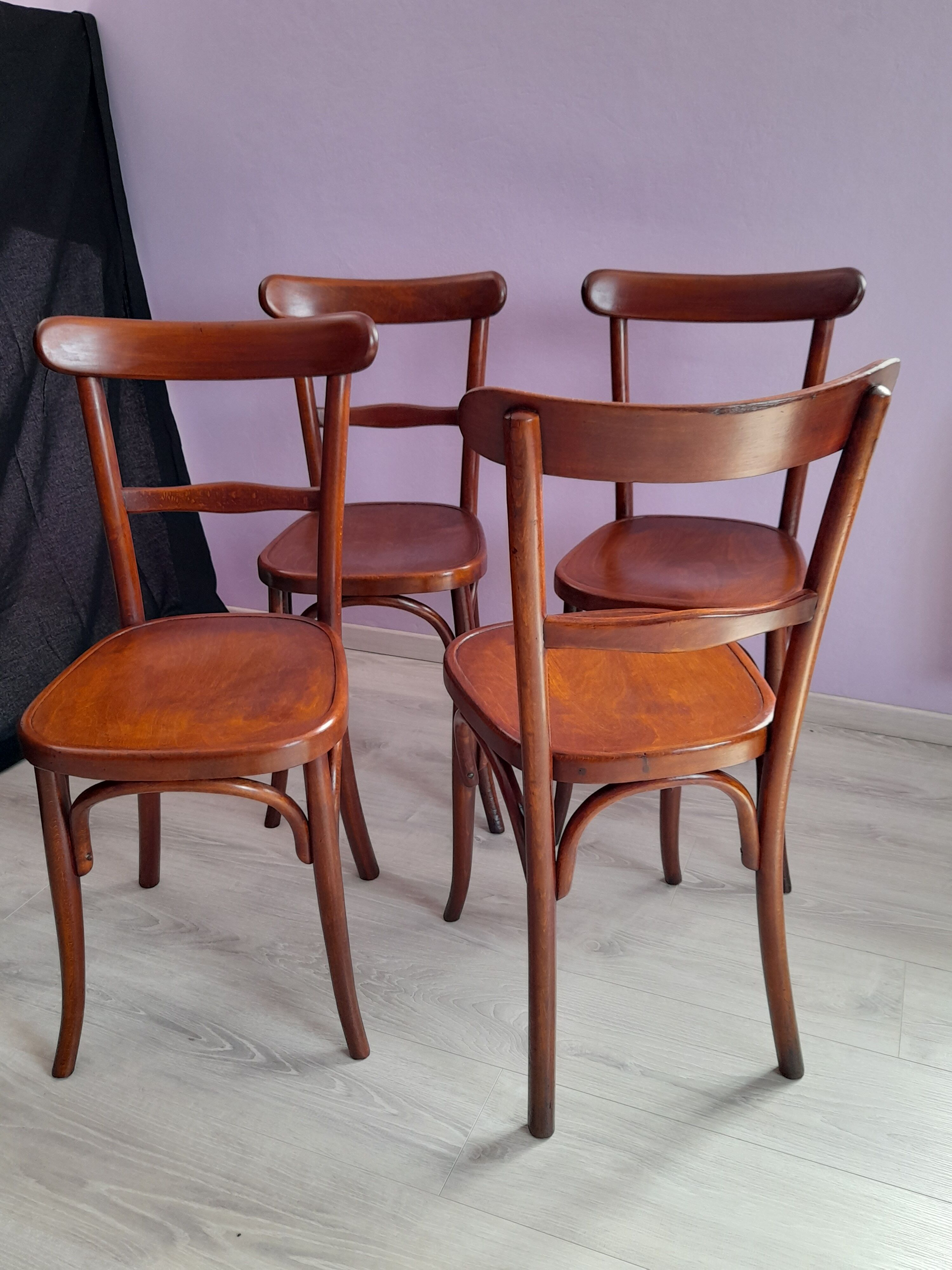 Suite of 4 bistro chairs, published by fischel