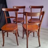Suite of 4 bistro chairs, published by fischel