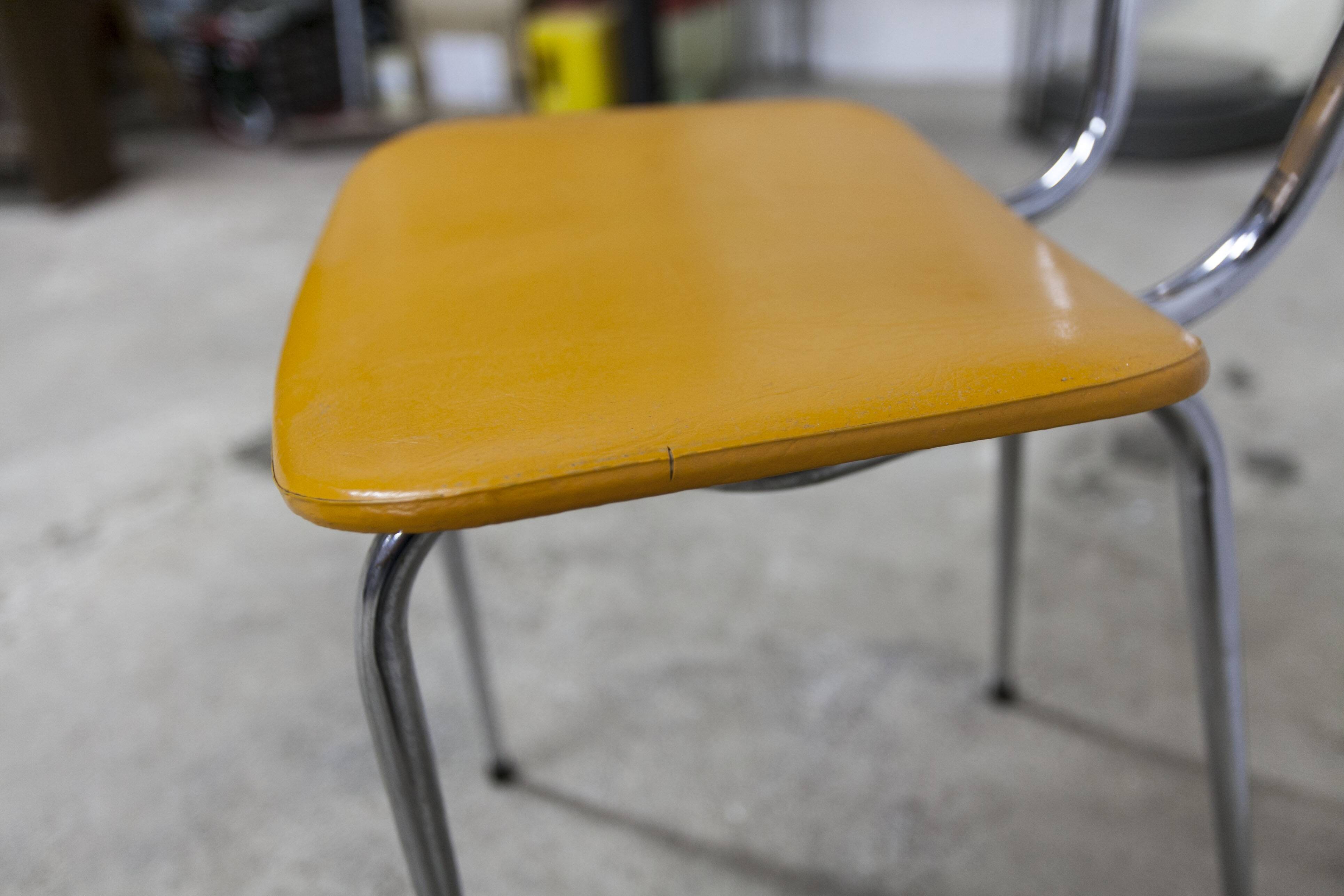 Pair of mustard-colored 70s welded Skai chairs