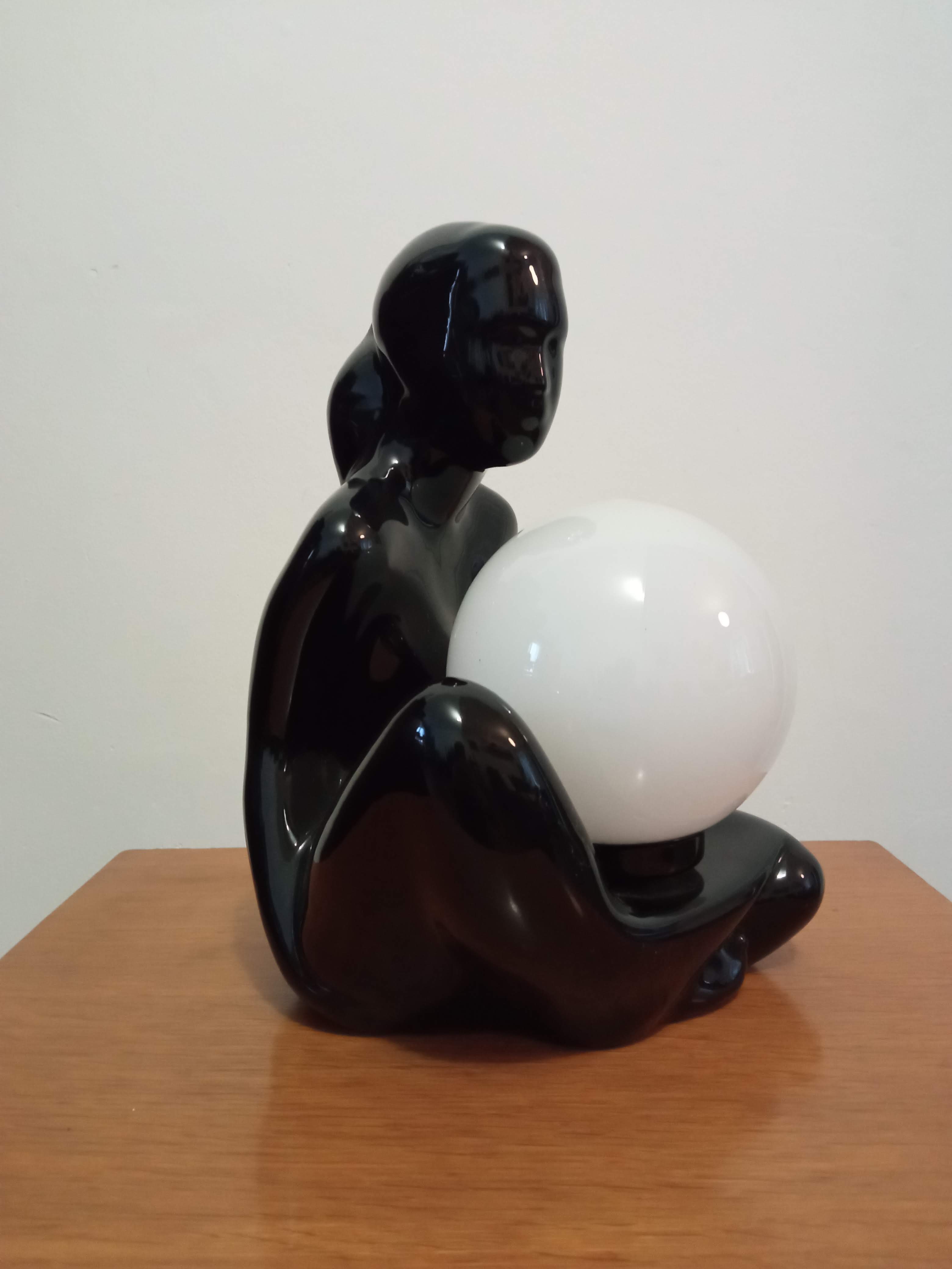 Lamp black ceramic and opaline globe circa 1970