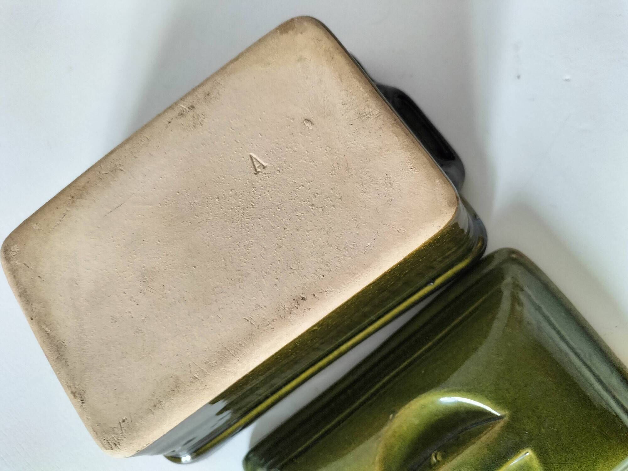 Small terrine in olive green glazed earthenware