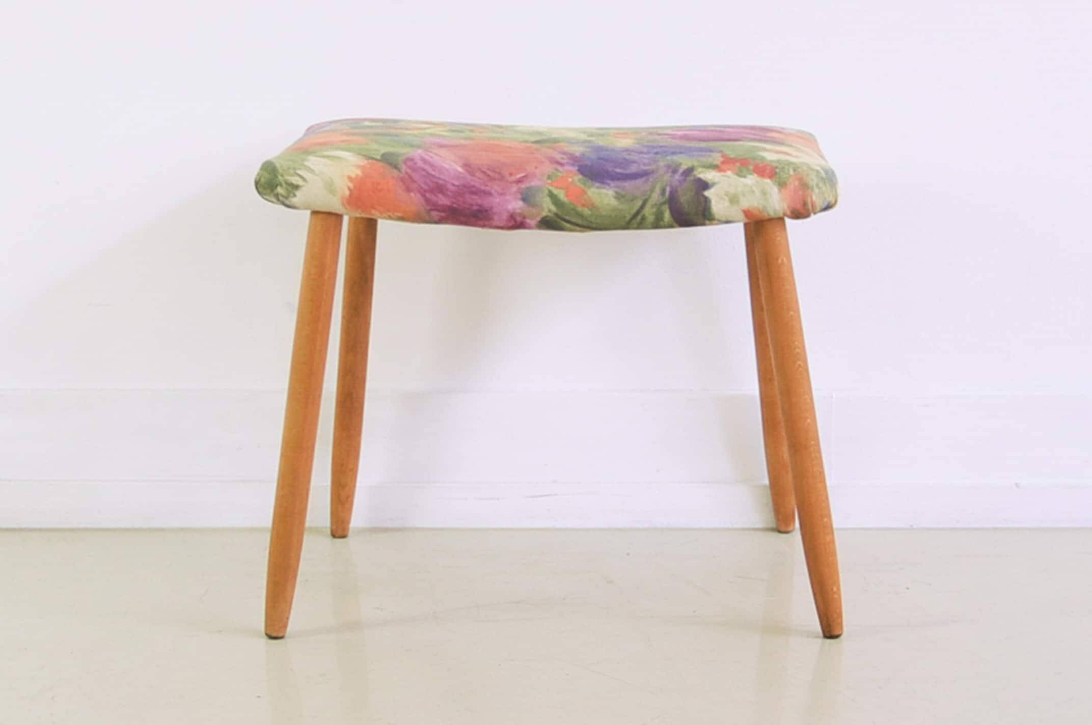 Footstool with flowered fabric