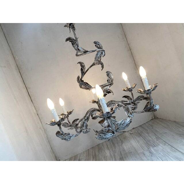 Contemporary brunish-clay florentine wrought iron leafs chandelier