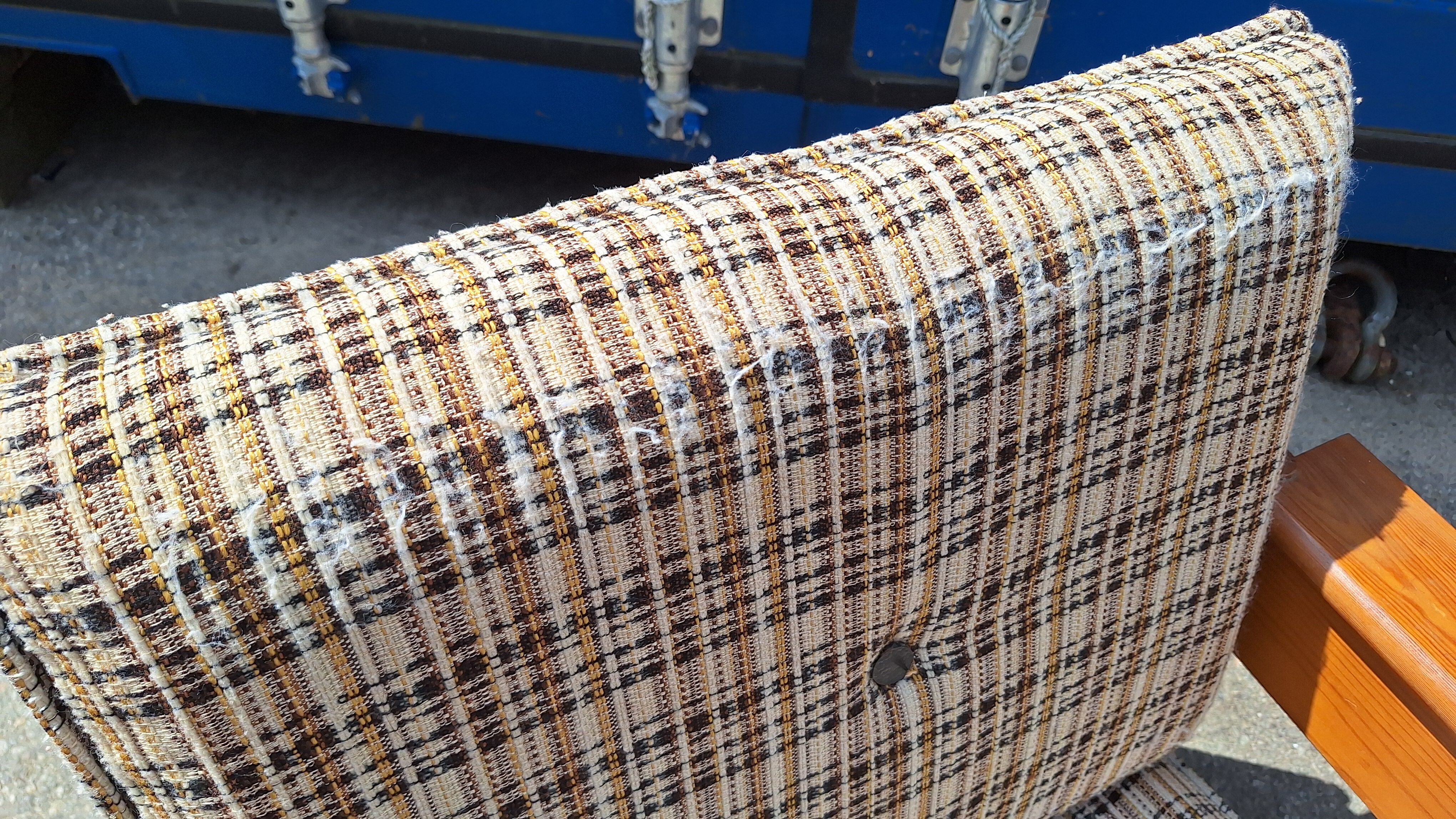 Brutalist-style bench and armchairs in 1970s pine.
