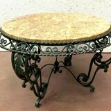 Round living room table in wrought iron and marble XX century