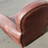 Club chair in brown leather