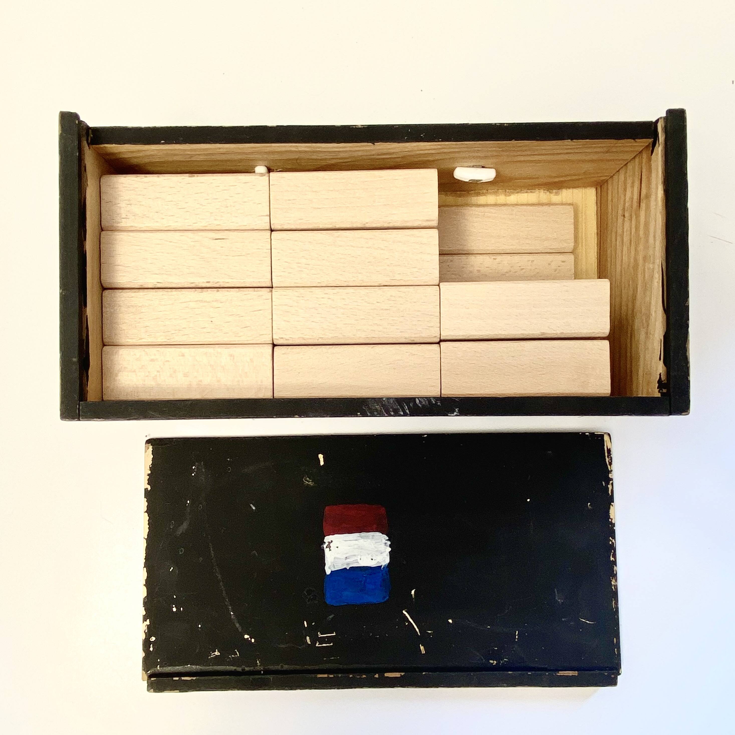 Old wooden construction game in its carrying case - 52 pieces