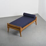 Wooden bench with midnight blue fabric, France, circa 1955