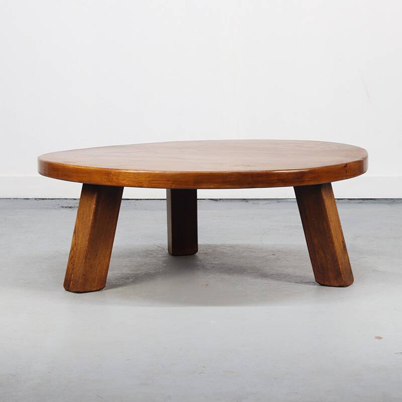 Large vintage round coffee table in raw oak brutalism.