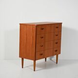 Scandinavian teak chest of drawers with sculpted recessed pulls