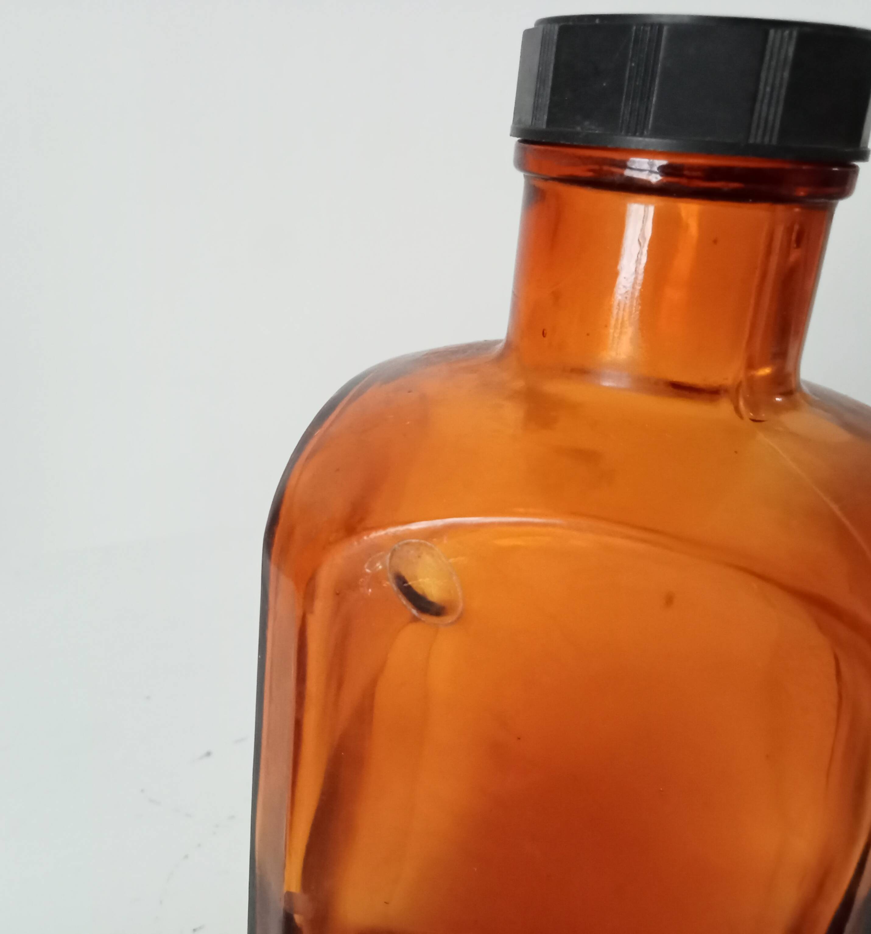 Old amber pharmacy bottle