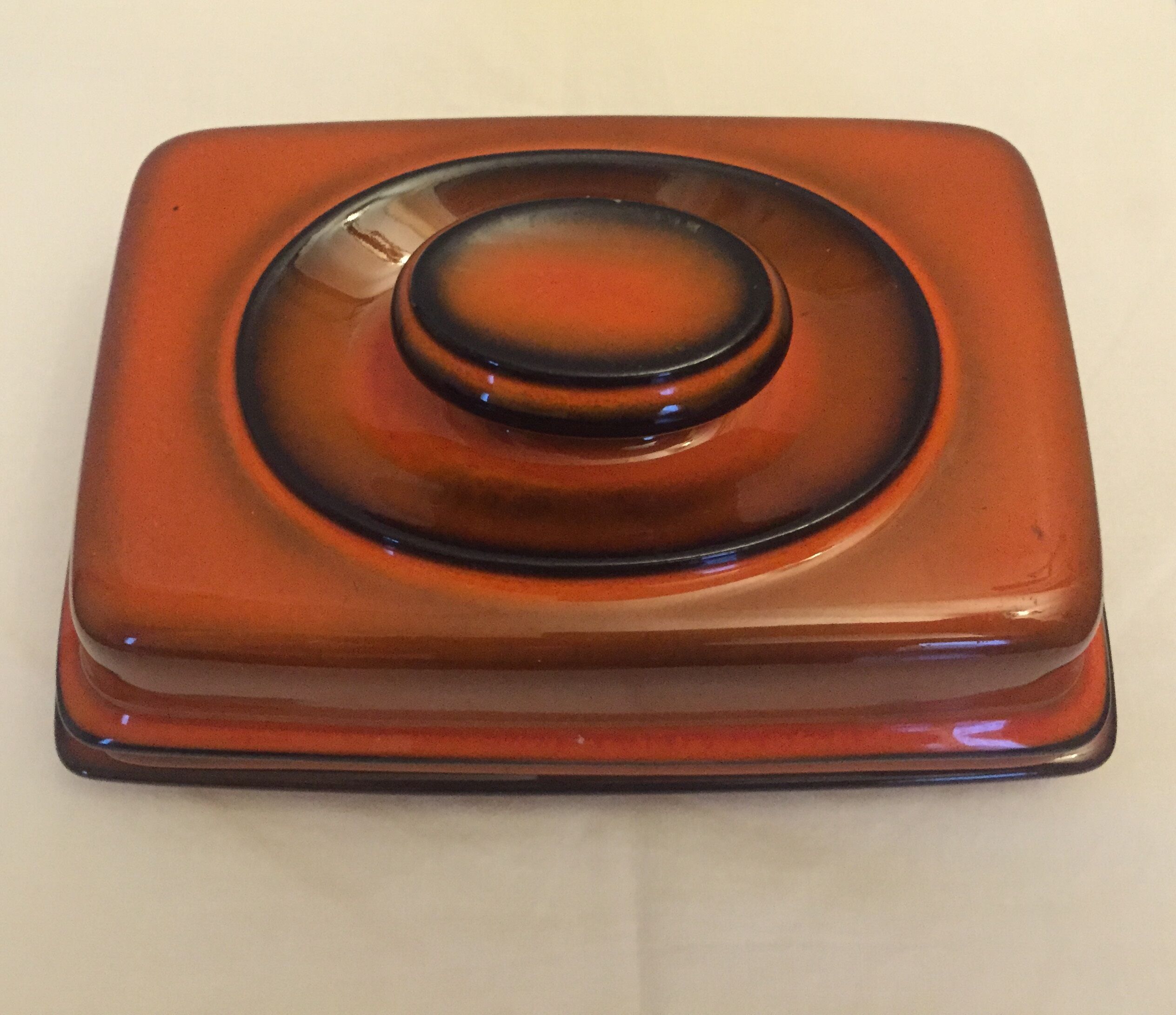 Red ceramic butter dish
