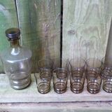 Set of 10 brown glasses and a carafe made in Belgium