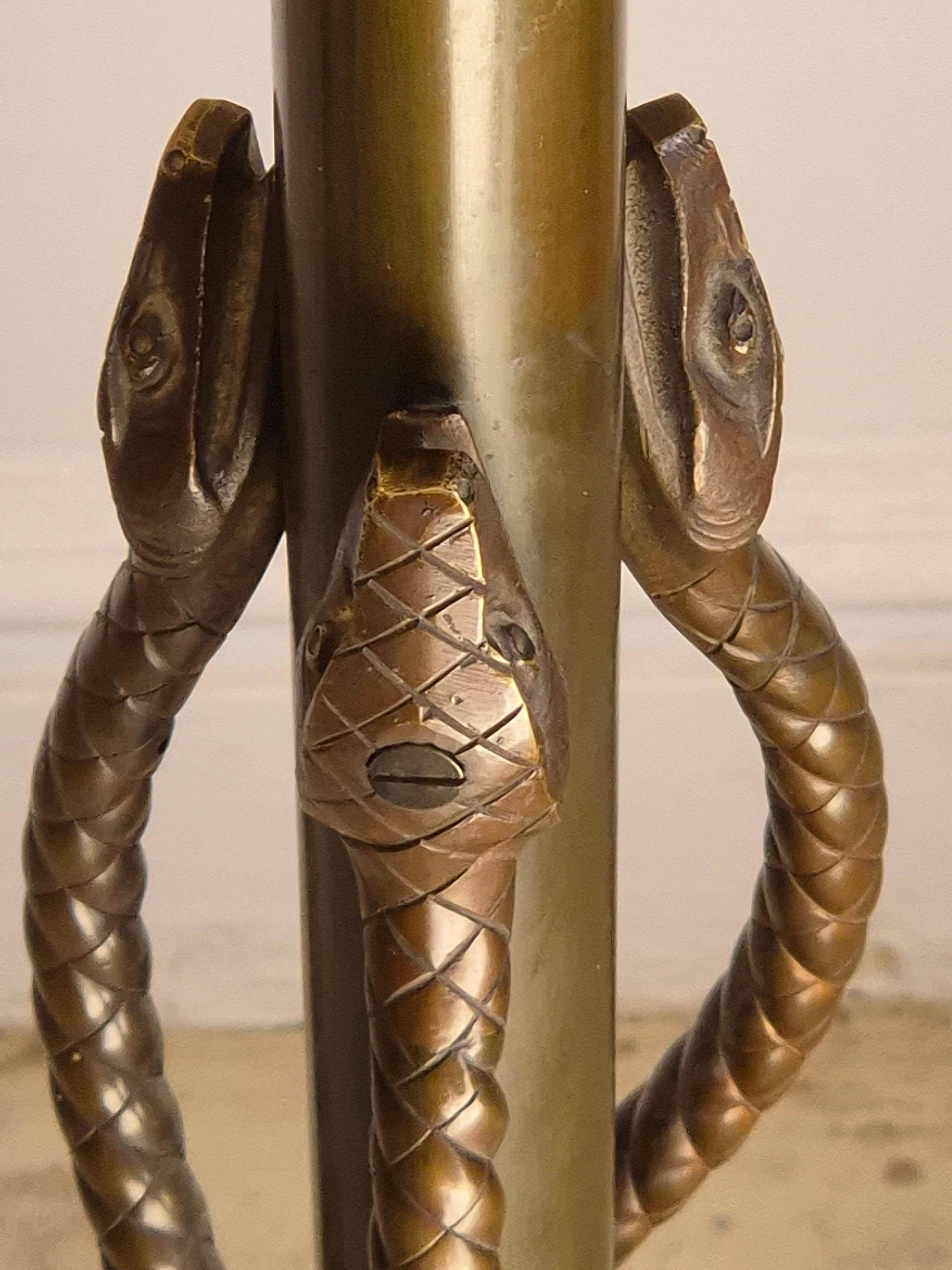 Rare and exquisite bronze floor lamp with intertwined snakes, early 1900s.