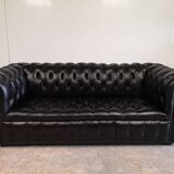 Black leather chesterfield sofa