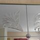 Panoramic mirror with etched parcloses in Art Deco style.