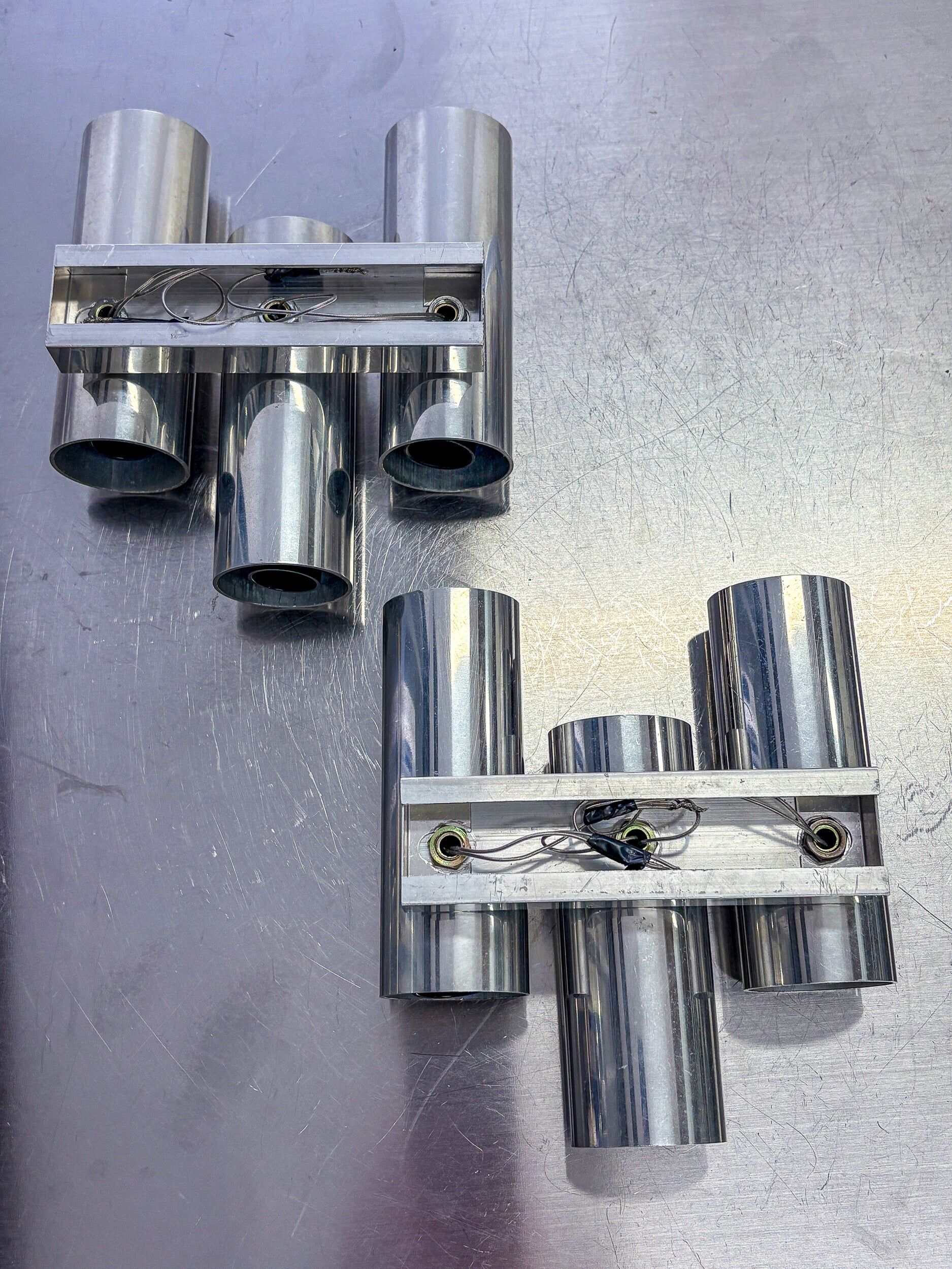 Pair of Gaetano Sciolari tubular chrome wall sconces, Italy 1970s