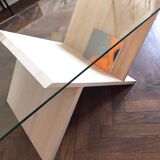 Design coffee table in solid beech and glass top