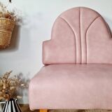 Single bar stool in pink stitched faux leather.