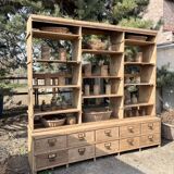 Large antique workshop furniture with drawers and shelves.