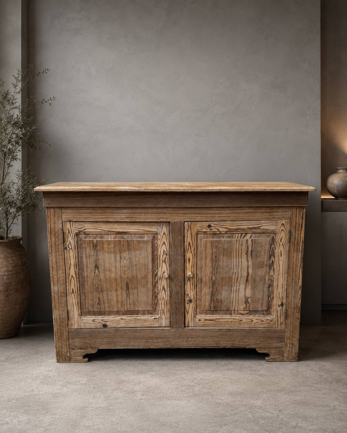 Old low sideboard in solid pitch pine