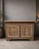 Old low sideboard in solid pitch pine