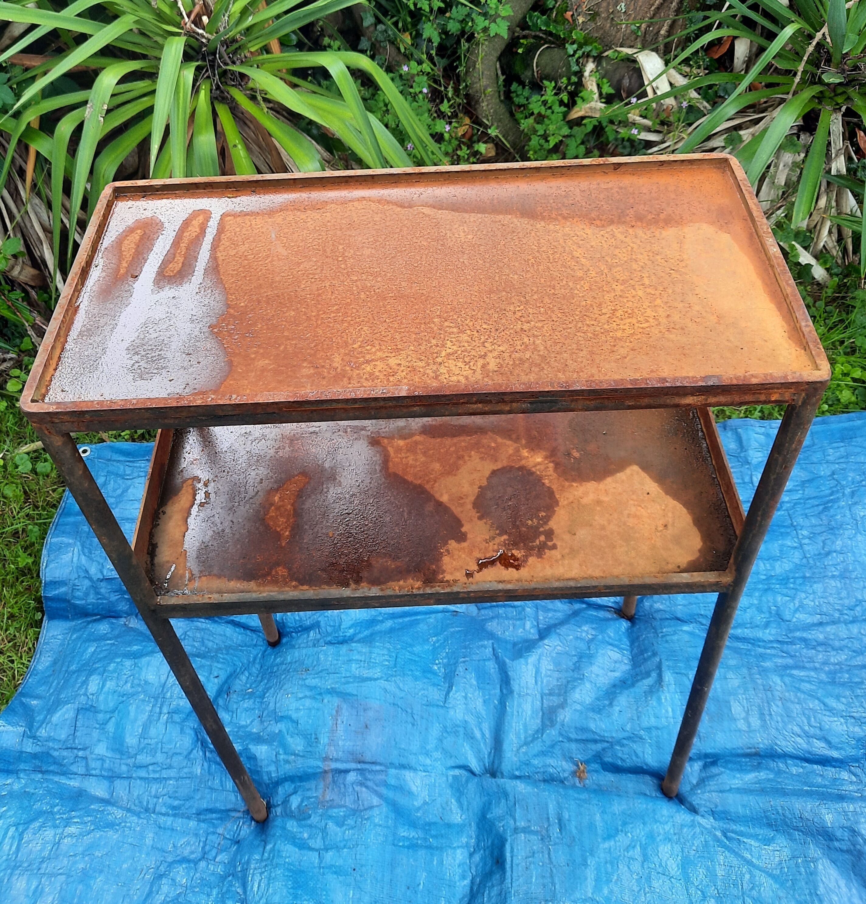 Pair of metal consoles