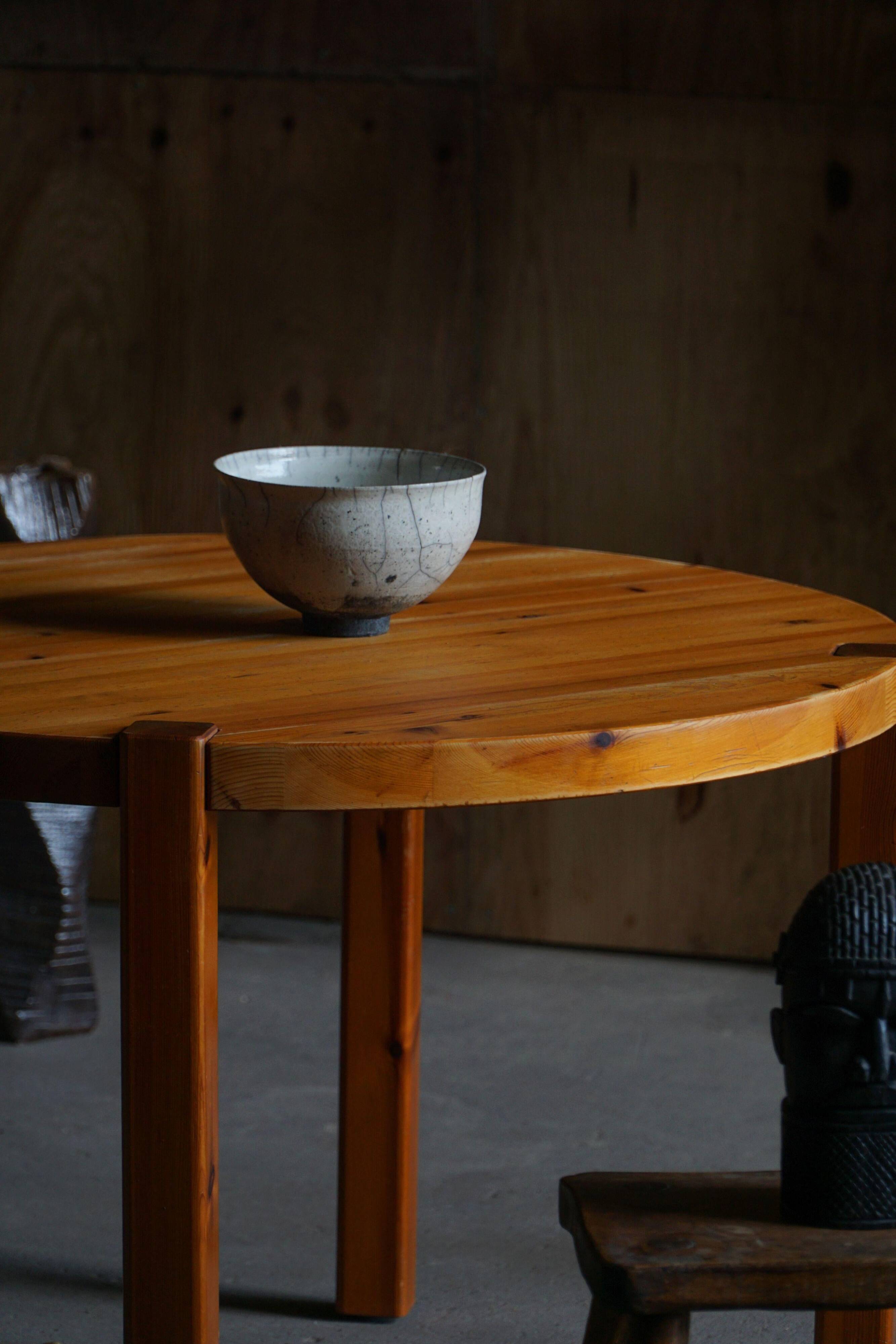 Mid-century Danish round dining table in solid pine, 1970s.