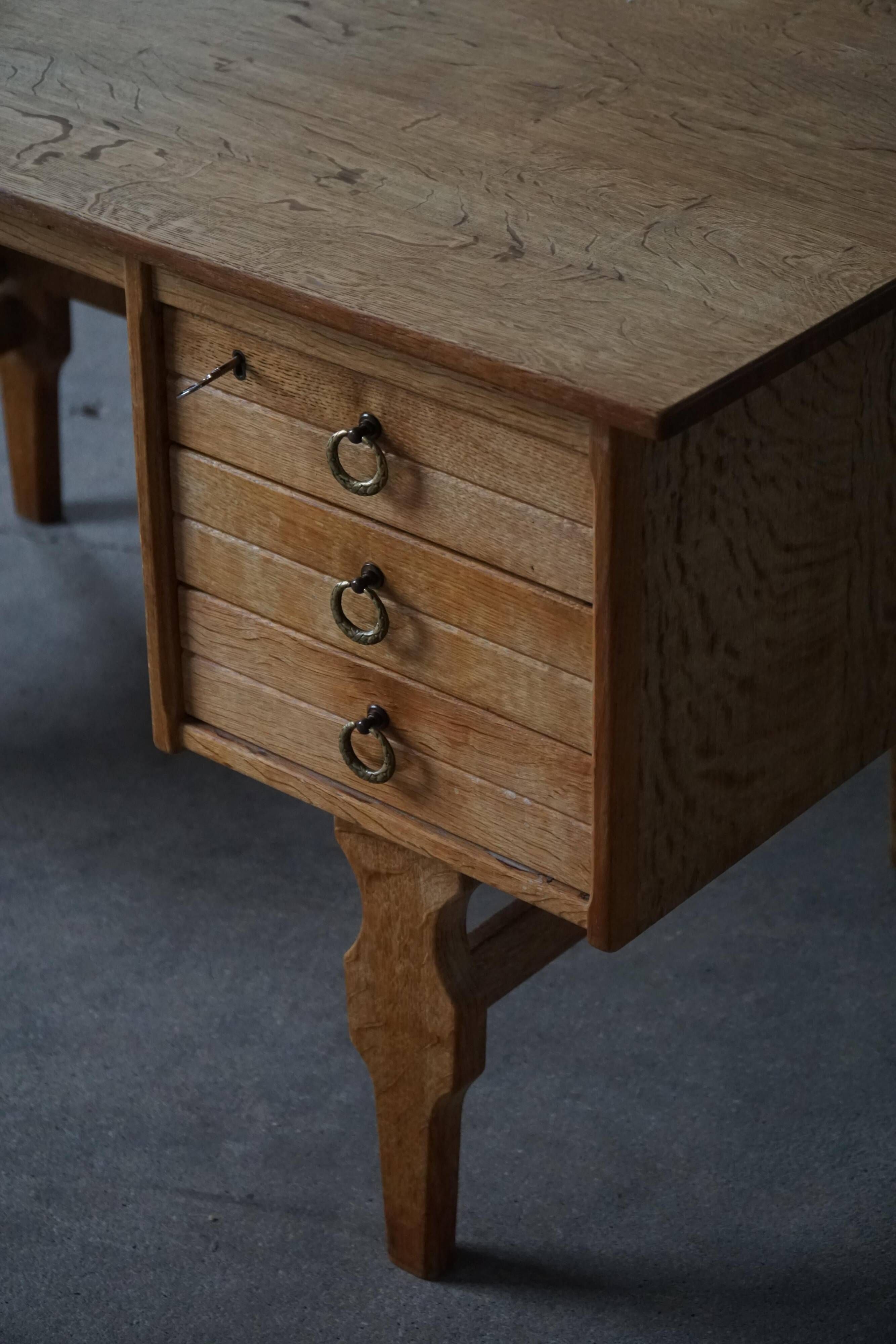 Free-standing oak desk by Henning Kjærnulf, mid-century Danish modernism, 1950s.