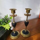 Pair of brass and black hard stone candlesticks
