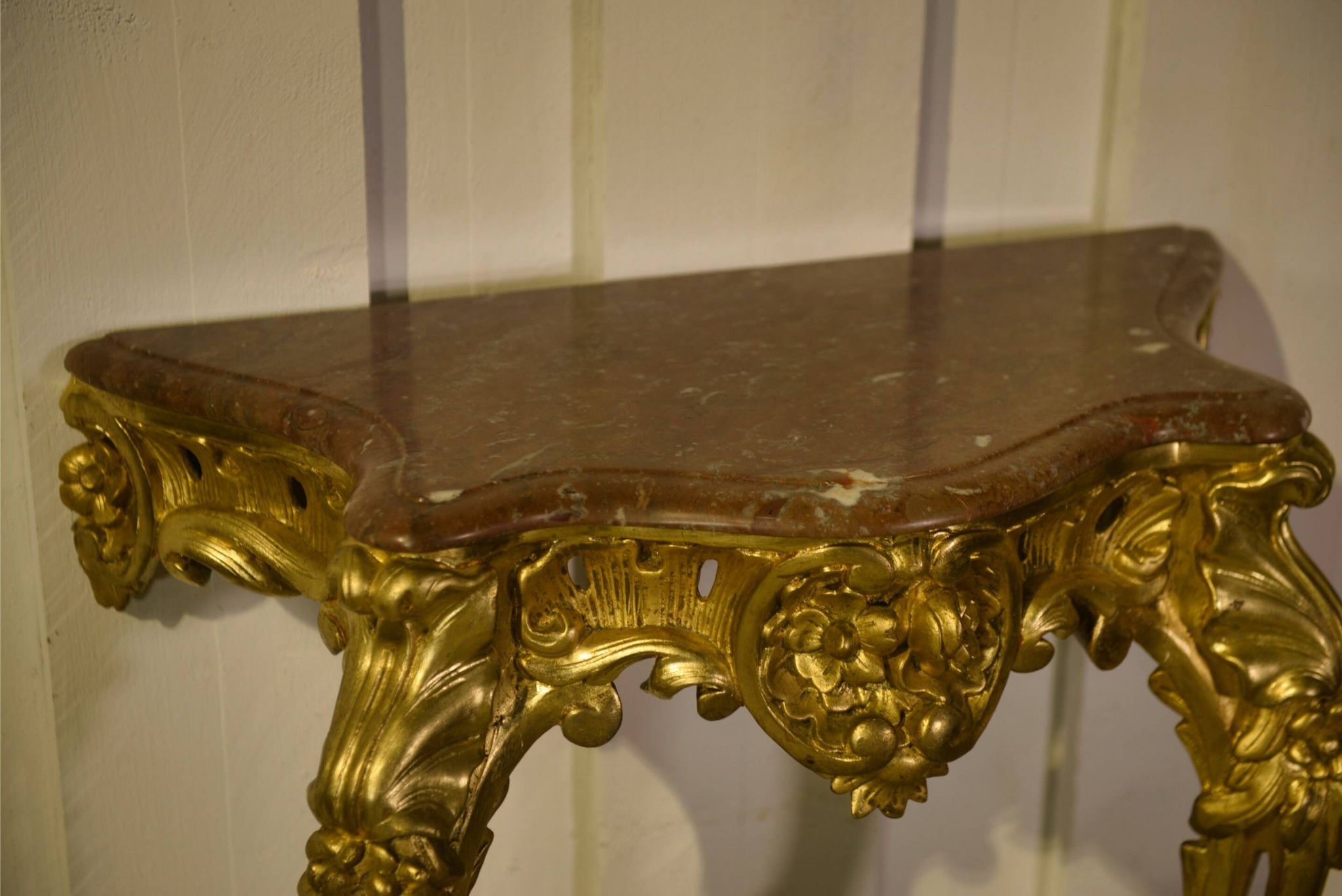 Golden wood and marble console, 19th century.