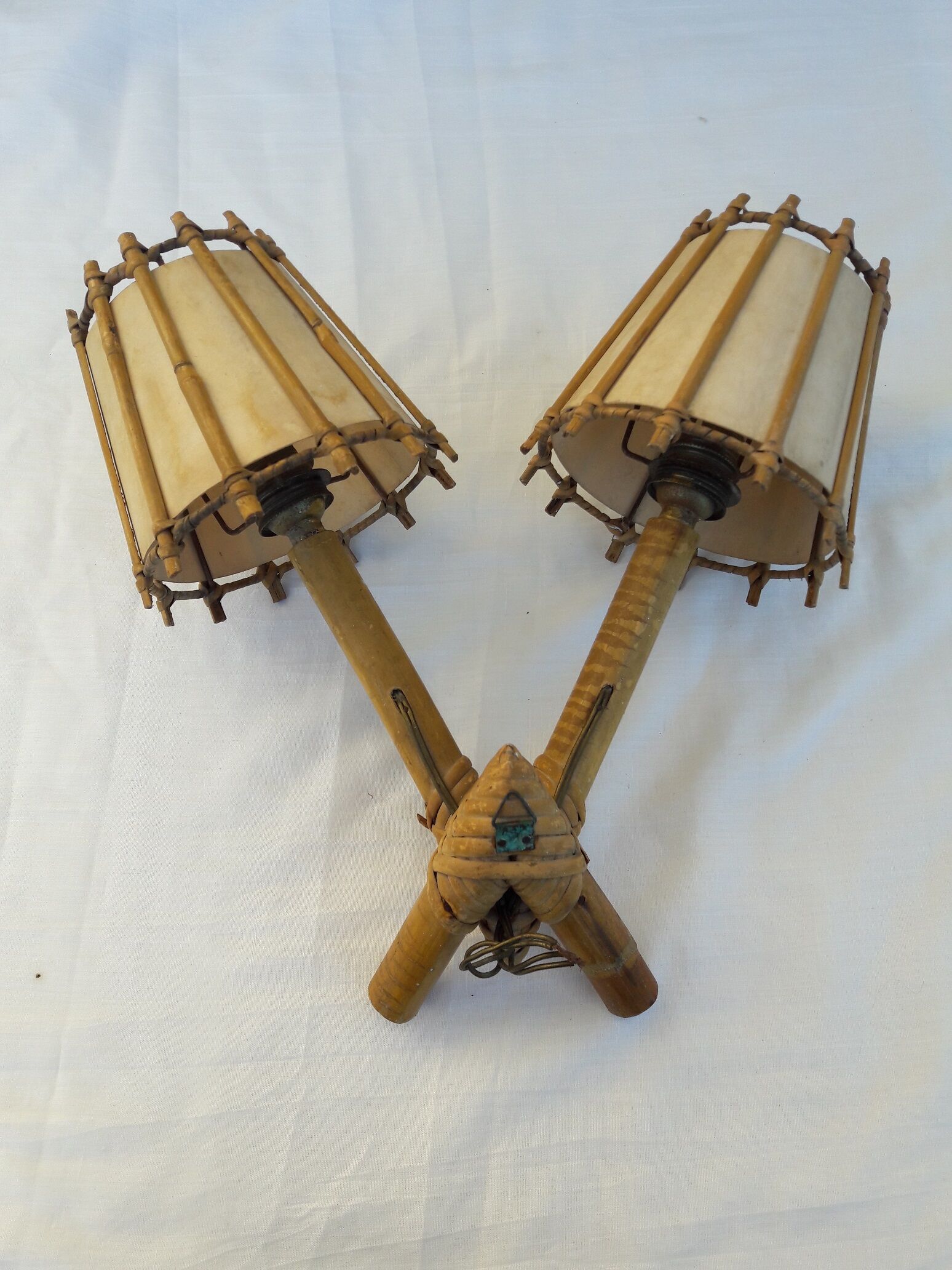Double rattan sconce