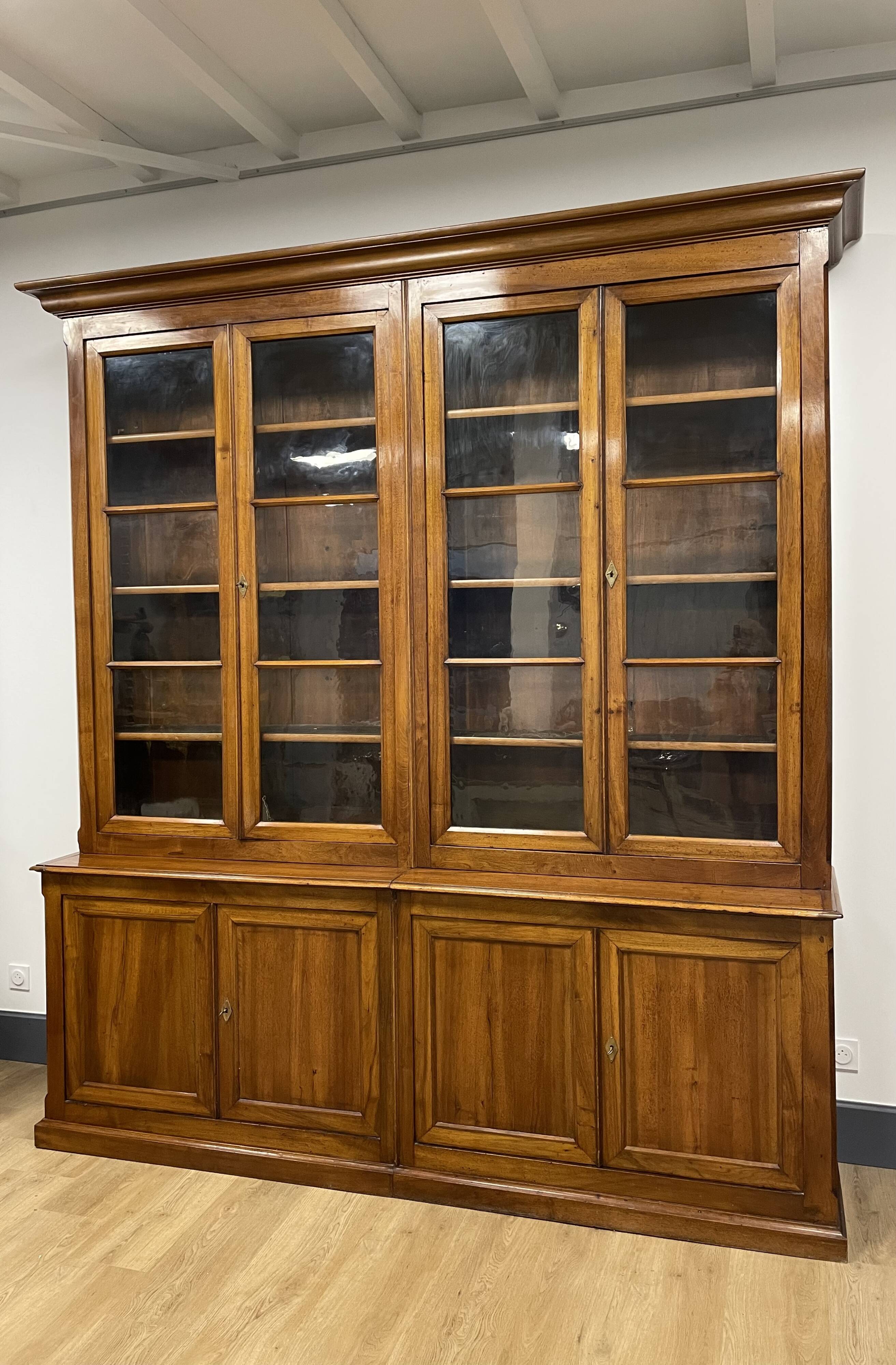 Large walnut bookcase from the end of the 19th century