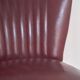 Burgundy leatherette cocktail chair, circa 1958