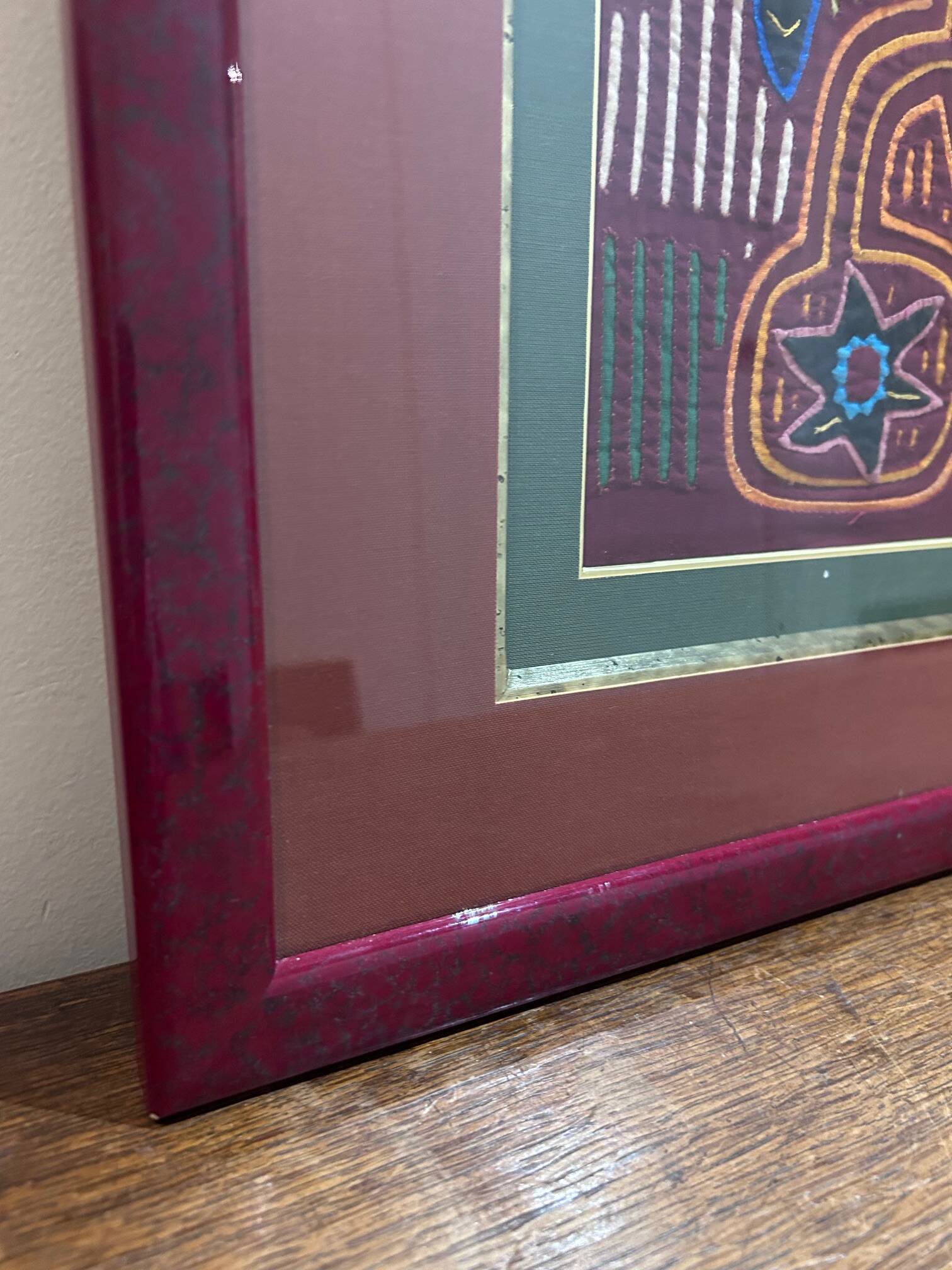vintage tapestry framed under glass
