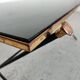 Table basse en laiton et verre