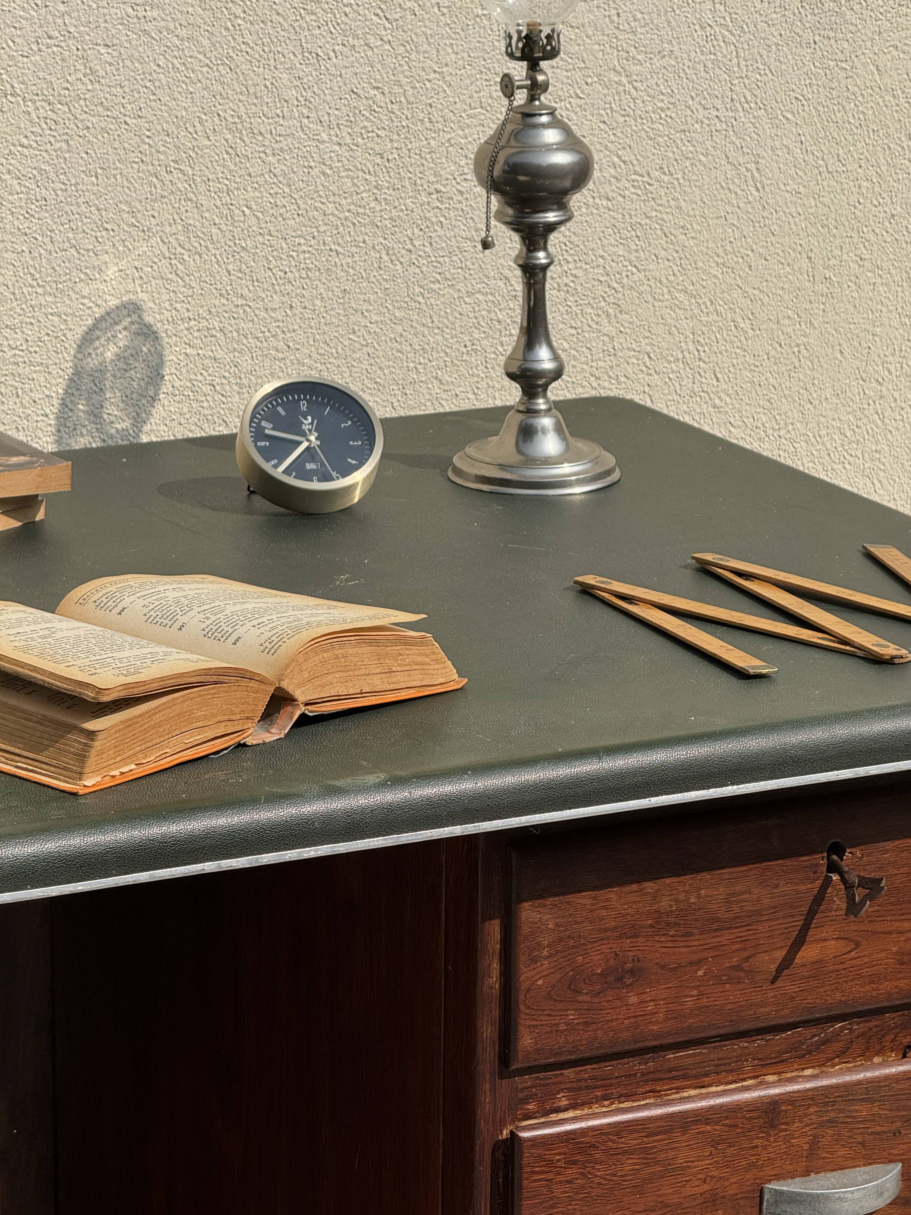 Modernist desk in wood and green moleskin upholstery