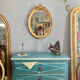 Miroir oval en bois doré 70x49cm