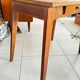 Old wooden desk or side table with compass legs
