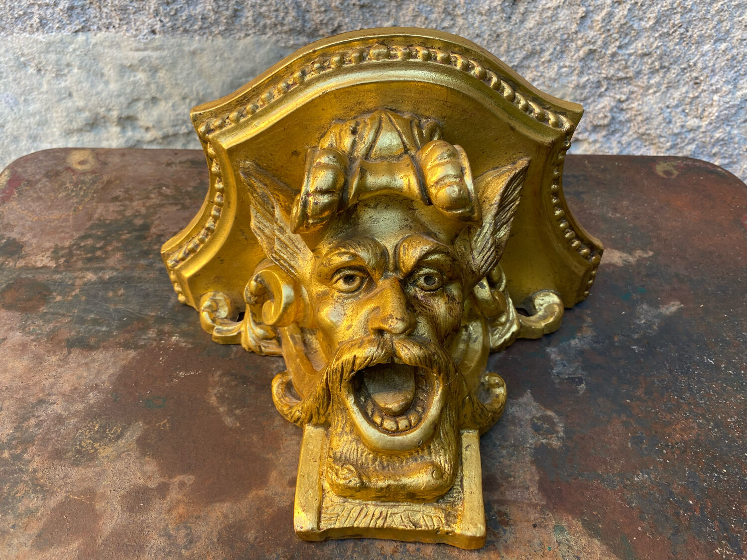 Devil's head wall console