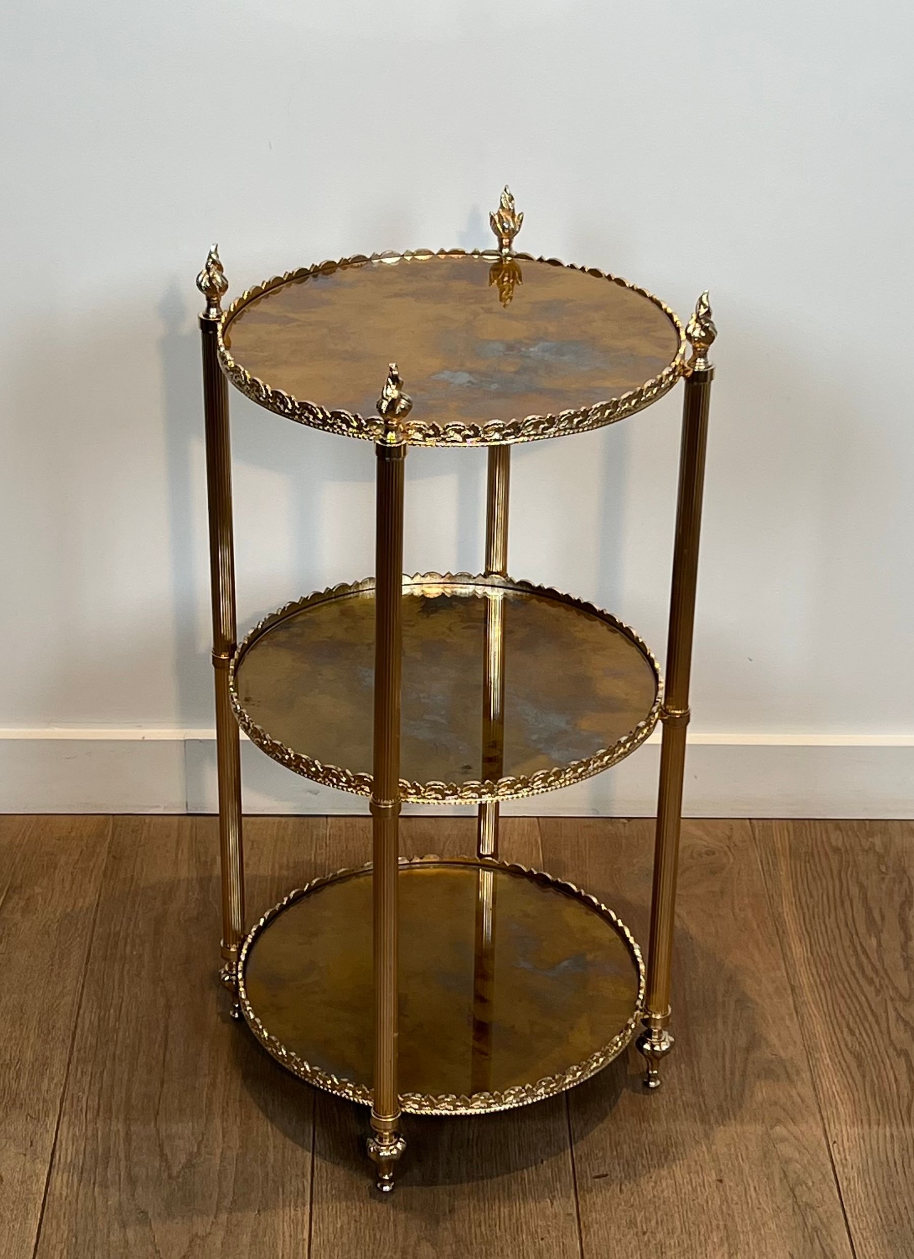 Round silver-plated brass table with triple eglomisé mirror tops from Maison Jansen.
