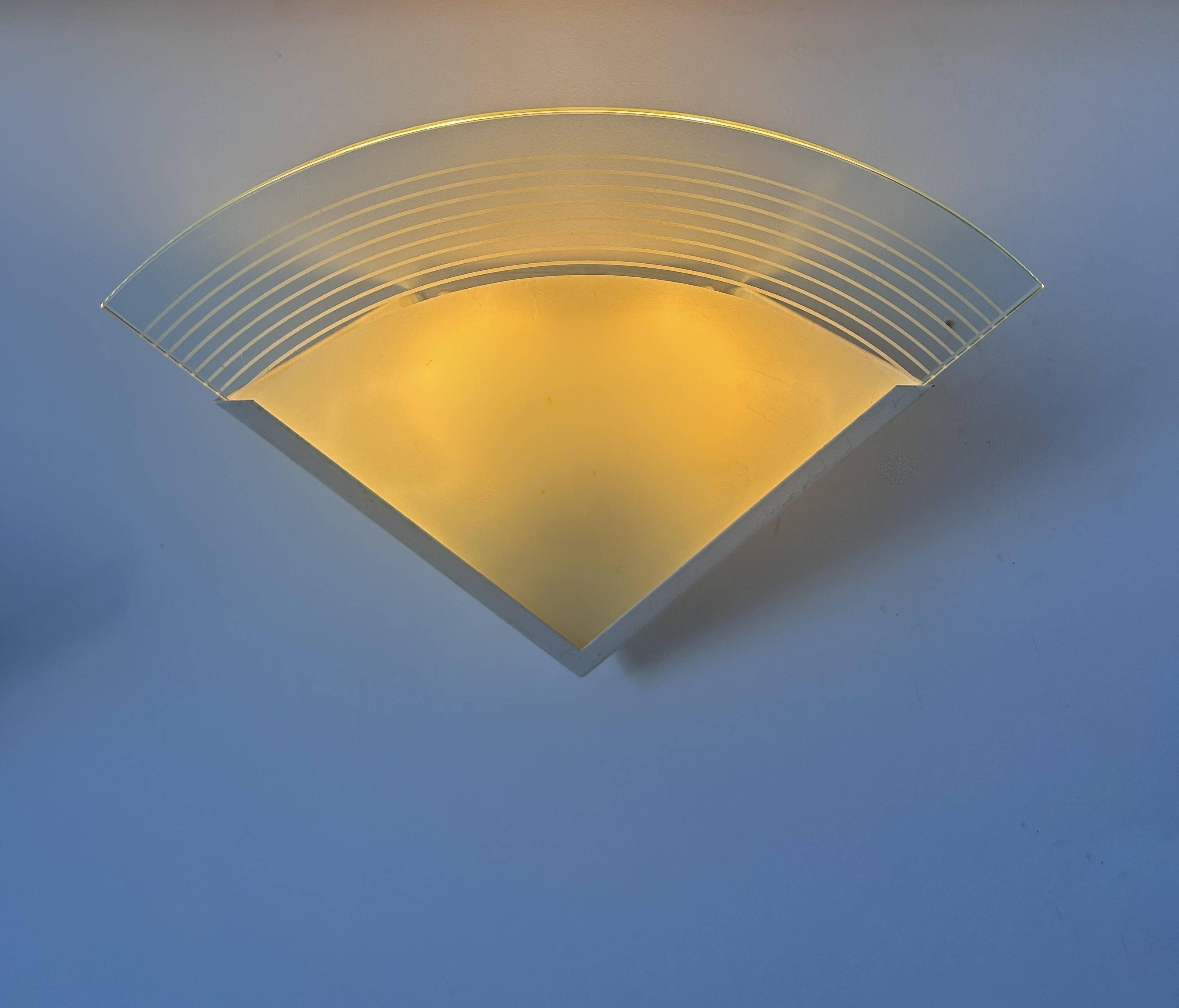 Pair of vintage wall lights, white lacquered metal and sandblasted glass, France 1970