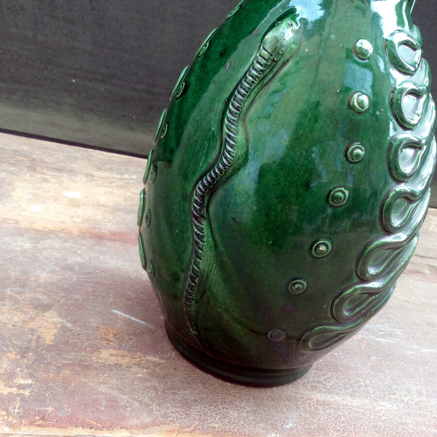 Terracotta jug in the shape of a soldier with a moustache