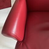 RED LEATHER ARMCHAIRS signed “SEDE”