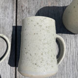 Set in stoneware cups and pitcher