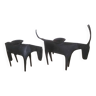 2 bougeoirs en métal figurant une vache et un taureau