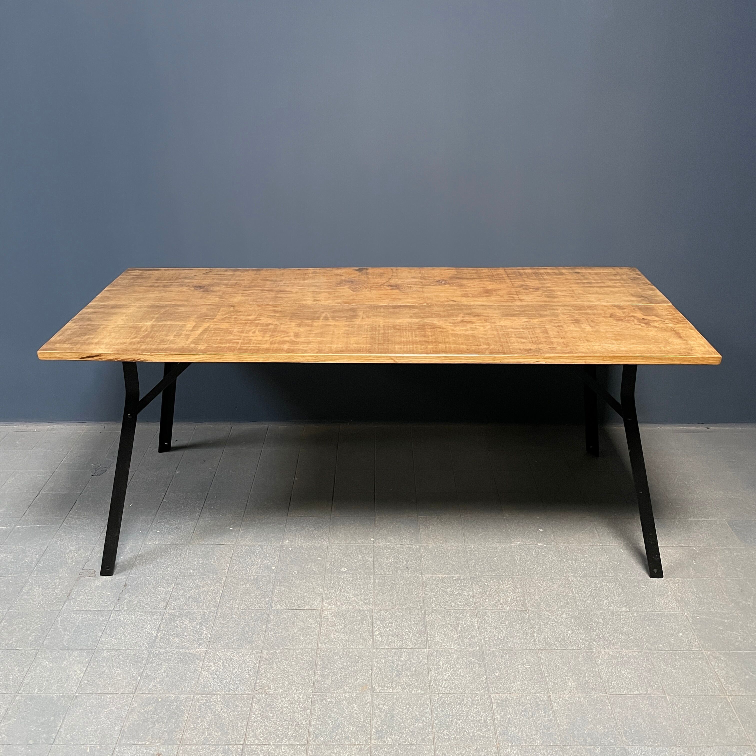 Handmade industrial oak dining table with black metal legs