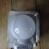 Opaline globe wall light with speckled plastic support dp 1123604