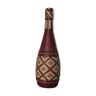 Ethnic bottle in leather 60s-70s
